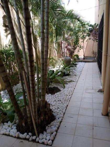A tropical paradise; stunning house pool garden - image 22